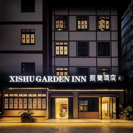 Xishu Garden Inn - Travel Agency Service - Car Rent Service - English Speaking Csengtu Kültér fotó
