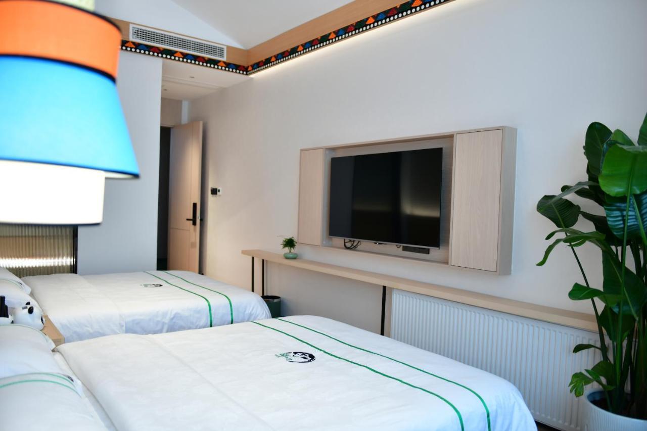 Xishu Garden Inn - Travel Agency Service - Car Rent Service - English Speaking Csengtu Kültér fotó