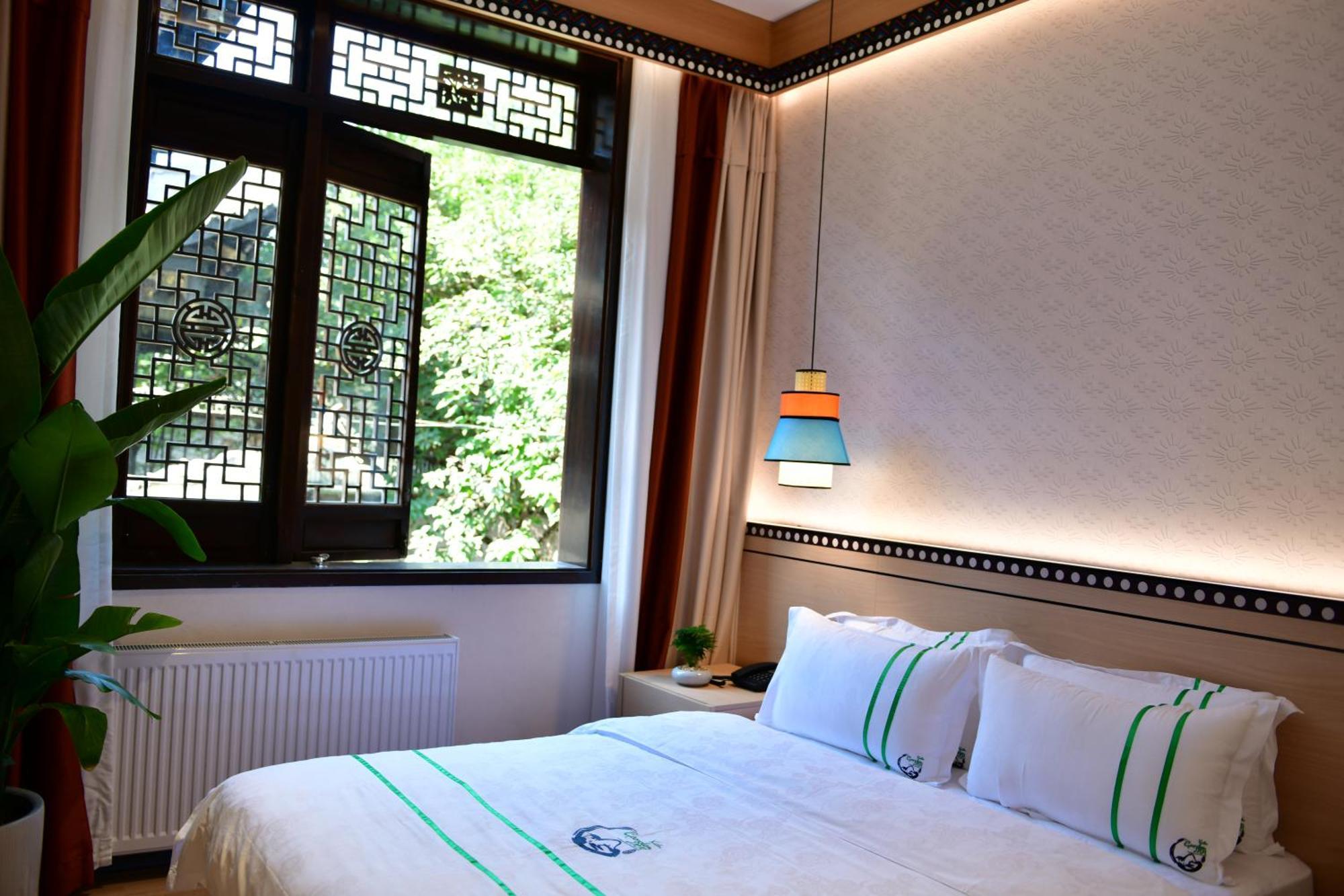 Xishu Garden Inn - Travel Agency Service - Car Rent Service - English Speaking Csengtu Kültér fotó
