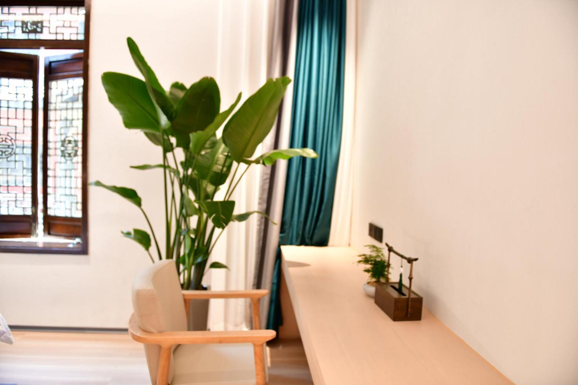 Xishu Garden Inn - Travel Agency Service - Car Rent Service - English Speaking Csengtu Kültér fotó